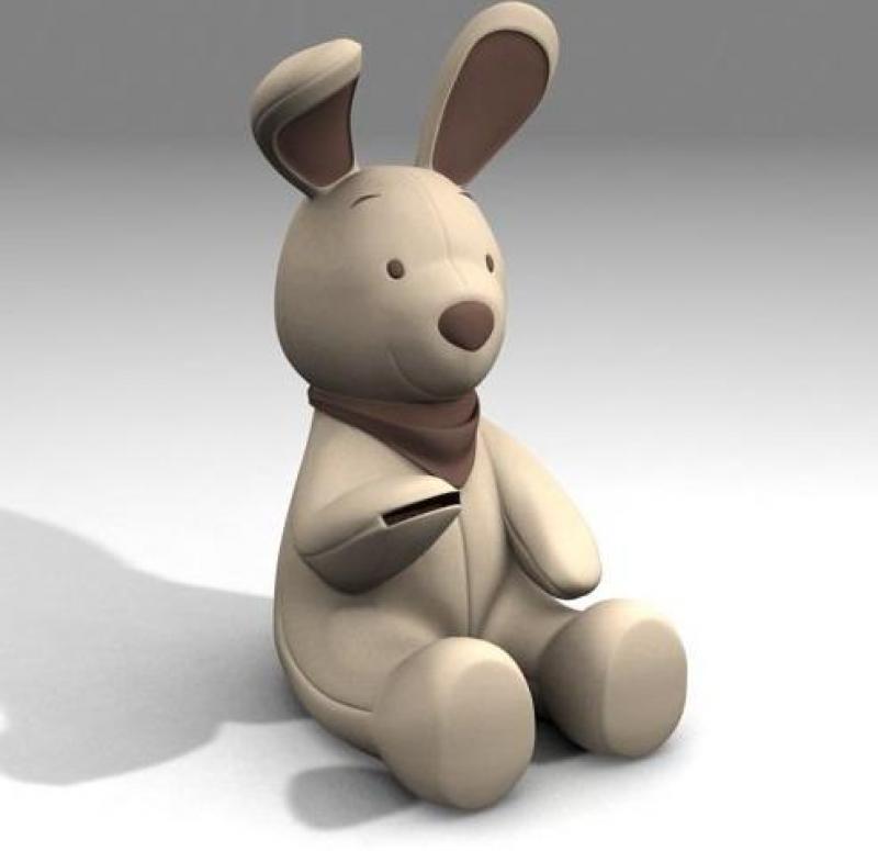 Tirelire Lapin 4 Biała pluszowa zabawka w kształcie królika z brązowymi uszami i brązową chustką na szyi.